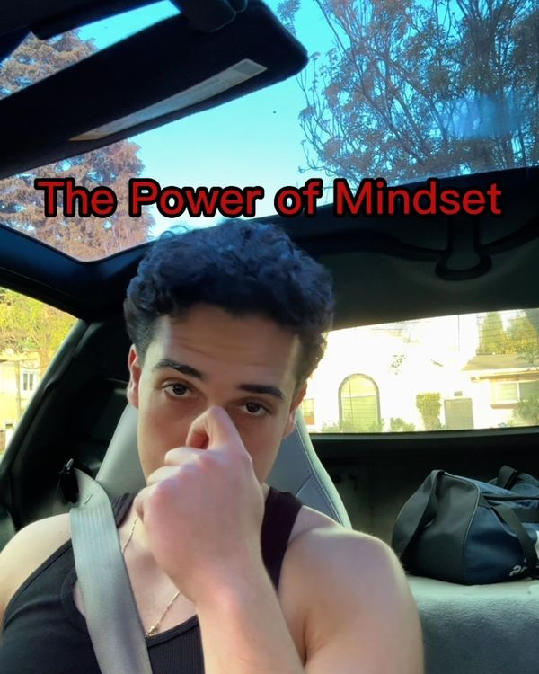 Josh in his car, captioned the power of mindset